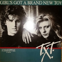 Girl's got a brand new toy (extraordinary D.J. mix) - T.X.T.